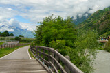 Fototapeta Sypialnia - Summer landscape along the cycleway of the Venosta valley