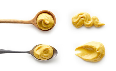 Set of mustard in spoons isolated on white background top view