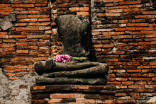 Broken Buddha Statue At Ayutthaya Historical Park Of Wat Mahathat.
