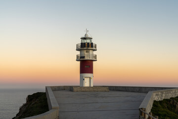 Poster - Cabo Ortegal lighthouse on the coast of Galicia at sunrise