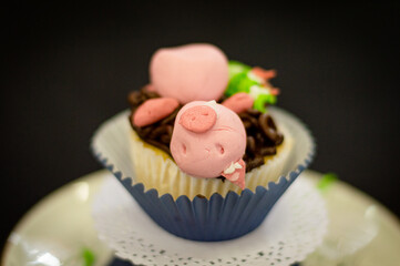 Wall Mural - cupcake with pink frosting pig shape 1