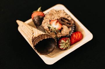 Wall Mural - chocolate cupcake with strawberries