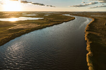 USA, Maryland, Drone View Of Marsh Along Blackwater River At Sunset