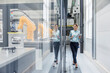 © Daniel Ingold/Westend61 - Businesswoman checking robots with digital tablet in high tech company