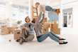 © Kniel Synnatzschke/Westend61 - Happy family moving into new home