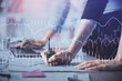 © peshkova - Multi exposure of woman hands typing on computer and financial chart hologram drawing. Stock market analysis concept.