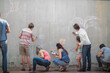 © zerocreatives/Westend61 - People drawing colourful pictures with chalk on a concrete wall