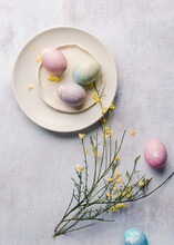 Colorful Dyed Eggs On Plates