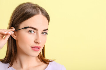 Sticker - Young woman undergoing eyebrow correction procedure on color background