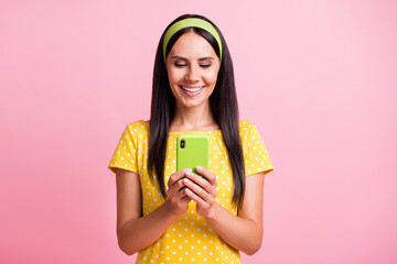 Poster - Portrait of pretty lady reading blog typing text yellow vintage outfit isolated on pink color background