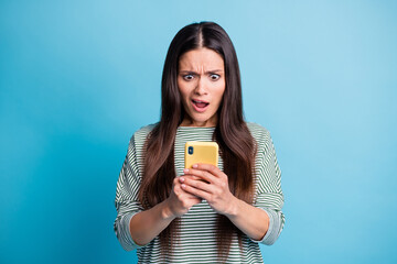 Sticker - Photo of impressed displeased lady staring screen open mouth wear white green isolated on blue color background