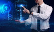 © Egor - Business, Technology, Internet and network concept. Young businessman working on a virtual screen of the future and sees the inscription: Business model