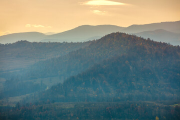 Wall Mural - Autumn in the mountains. View of the mountains ridge at sunset. Beautiful nature landscape. Carpathian mountains. Zakarpattia Oblast, Ukraine