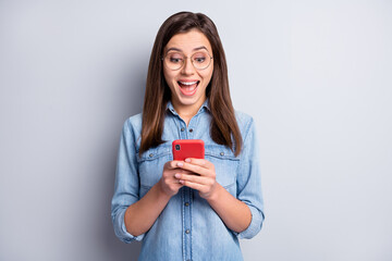 Wall Mural - photo of impressed lady open mouth unexpected like typing post good news isolated on grey color back