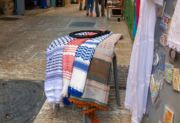 Arab  headdresses with national ornaments are sold in the oriental bazaar called Garden Of Eden Bazzar in the old city of Jerusalem in Israel