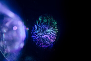 Close up beautiful abstract multi colored fingerprint on  background texture for design. Macro photography view.