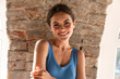 © Drobot Dean - Young happy brunette woman smiling and looking at camera