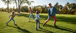 © Svitlana - Remember the time. Excited family running outdoors on a sunny day