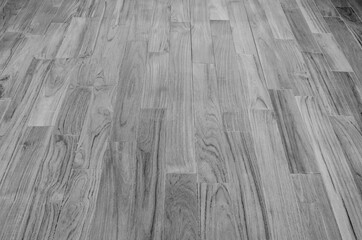 Varnished teak parquet in monochrome perspective
Black and white photography of a teak wood background texture, in rustic and vintage style.