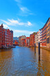 Beautiful view of famous Hamburg Speicherstadt warehouse district on a sunny day in summer, Hamburg, Germany