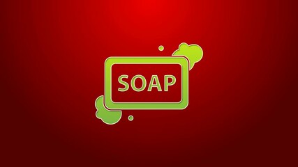 Wall Mural - Green line Bar of soap with foam icon isolated on red background. Soap bar with bubbles. 4K Video motion graphic animation