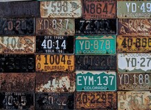 Close-up Of Old Rusty License Plates