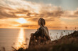 © Marijus - woman on the beach at sunset