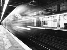 Blurred Motion Of Train At Railroad Station