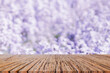 abstract blur lavender agriculture farm and gardening background with perspective wood table for show , promote ,and design content or product on display concept