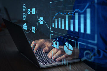 analyst working with business analytics and data management system on computer to make report with k