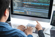 © Ngampol - Team of Professional Developer programmer cooperation meeting and brainstorming and programming in website working a software and coding technology, writing codes and database