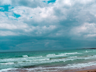 blue rough sea view with clouds  