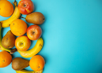 Wall Mural - background with fruits apples bananas pears oranges