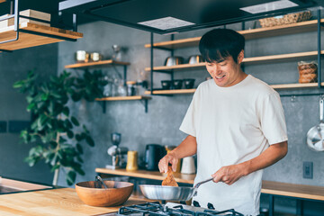 Poster - 料理する男性
