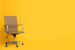 © New Africa - Modern office chair on yellow background. Space for text