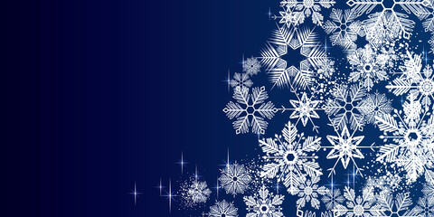 Canvas Print - White winter snowflakes on a blue background - Merry Christmas and winter snow design banner