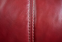 Full Frame Shot Of Red Leather Sofa