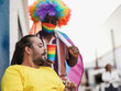 © Sabrina - Gay men at gay pride parade - Drag queen and african gay man with lgbt rainbow flag