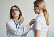 © SHOTPRIME STUDIO - Health problems female patient and professional doctor glasses model stethoscope