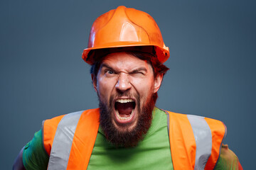 emotional man worker orange paint hard work