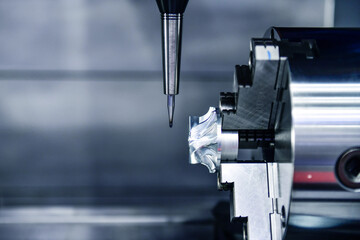 Wall Mural - the 5-axis cnc mills machines for design configuration that utilizes a swivel head machine table and