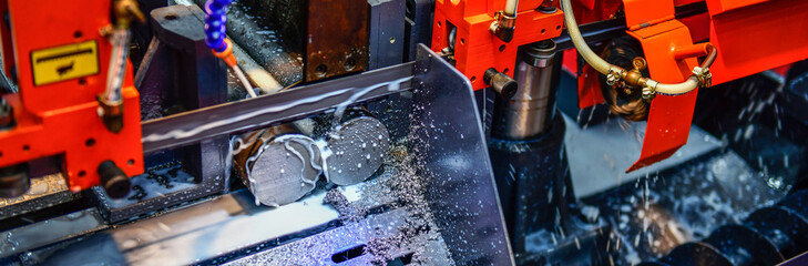 Wall Mural - industrial metal working cutting process the raw material bar clamping on the cnc lathe machine, ban