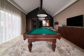 Wall Mural - modern billiard room with a beautiful table and large windows