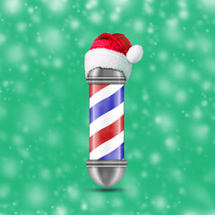 Barber pole in the hat of Santa Claus, on a green background. Snow effect. Beauty and fashion, Christmas background.