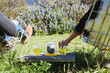 © Trinette Reed/Stocksy - Couple drinking tea outdoors