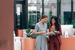 © Lumina/Stocksy - Two Elegant Businesswomen Working Together