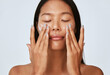© Leandro Crespi Studio/Stocksy - Woman Applying Face Lotion - Natural Skincare