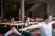 © JAVIER PARDINA/Stocksy - Scenes from a yoga class.