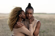 © JAVIER PARDINA/Stocksy - Portrait of two Afro European teenager girls in a natural landscape, with sunset light.
