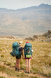© Micky Wiswedel/Stocksy - Hikers navigating a mountain trail